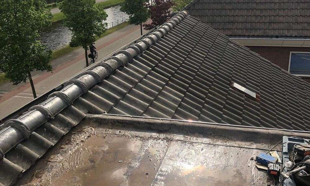 Lekkage op plat dak in Sprundel